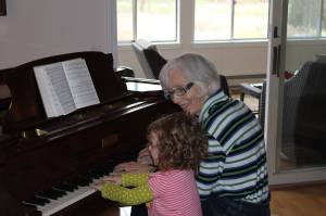 Nancy Roberts at piano with grand